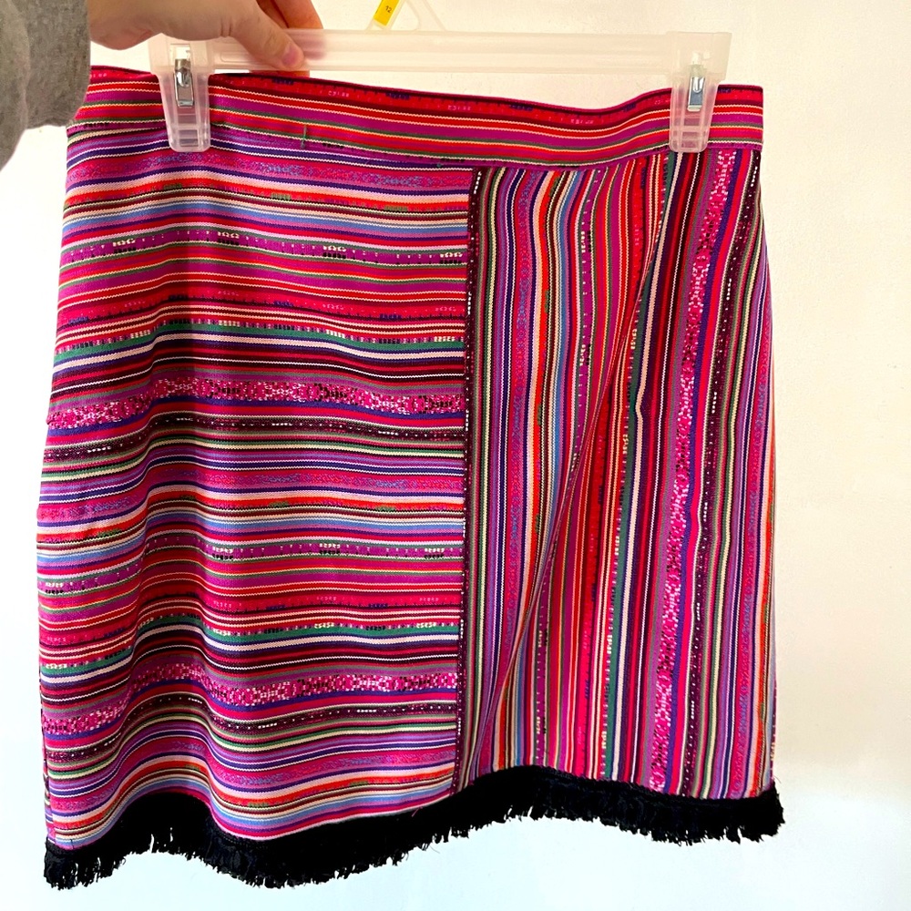 Savanna Jane Mini tribal skirt, black fringe at the bottom with a metal zipper